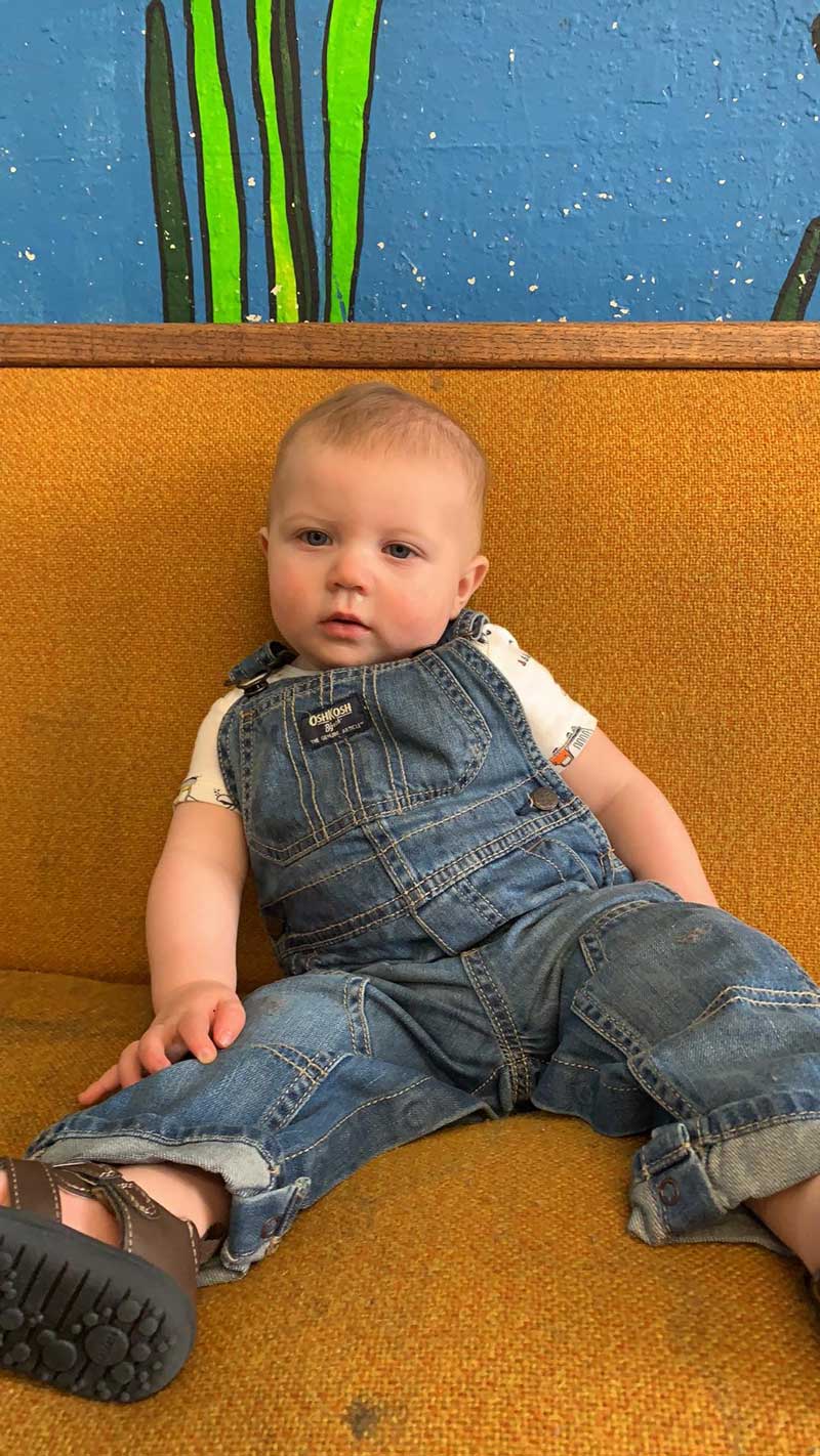 Infant sitting in a calm, safe infant care services environment in Twin Falls, ID